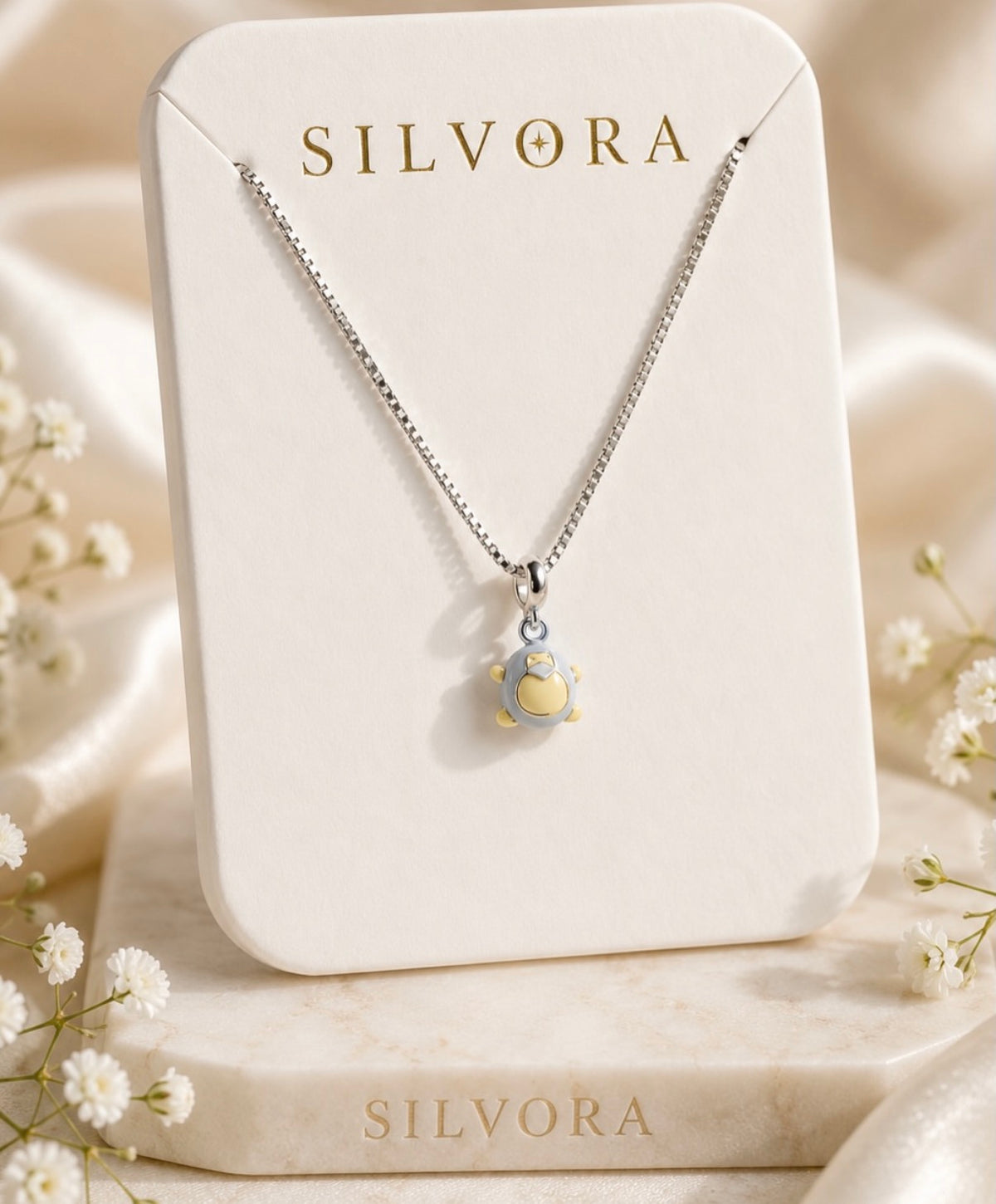 Silvora Sunburst Charm